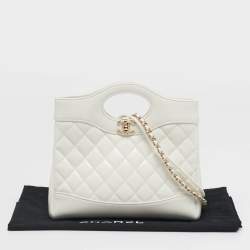 مملوكة مسبقًا حقيبة تسوق شانيل بيتي 31 جلد براءات أخضر/أسود مبطن