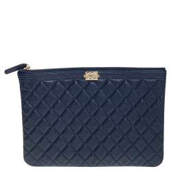 Pre Owned Chanel Blue Quilted Caviar Leather Boy Large O-Case Zip Pouch