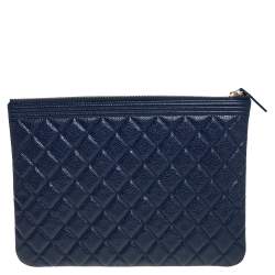 Pre Owned Chanel Blue Quilted Caviar Leather Boy Large O-Case Zip Pouch