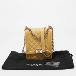 Pre Owned Chanel Gold Quilted Caviar Leather North South Boy Flap Bag