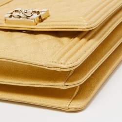 Pre Owned Chanel Gold Quilted Caviar Leather North South Boy Flap Bag