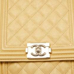 Pre Owned Chanel Gold Quilted Caviar Leather North South Boy Flap Bag