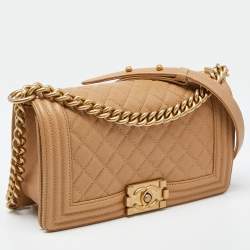 Pre Owned Chanel Beige Quilted Caviar Leather Medium Boy Flap Bag