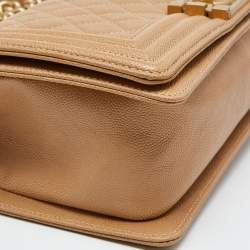 Pre Owned Chanel Beige Quilted Caviar Leather Medium Boy Flap Bag