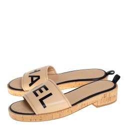 مملوكة مسبقًا صندل سلايد شانيل فيلين شعار أسود / بيج مقاس 40