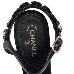 مملوكة مسبقًا  صندل شانيل كاميليا أبليكي جلد أسود سير كاحل مقاس 38