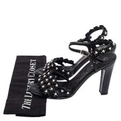 مملوكة مسبقًا  صندل شانيل كاميليا أبليكي جلد أسود سير كاحل مقاس 38