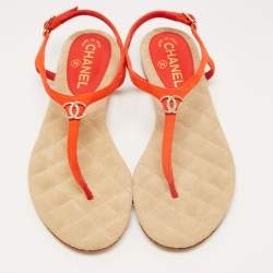Pre Owned Chanel Orange Suede CC Embellished Ankle Strap Thong Flat Sandals Size 38