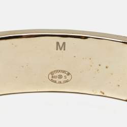 Pre Owned Chanel Logo Enamel Gold Tone Cuff Bracelet M