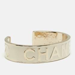 Pre Owned Chanel Logo Enamel Gold Tone Cuff Bracelet M