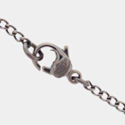 Pre Owned Chanel CC Crossbones Pendant Necklace Silver Black