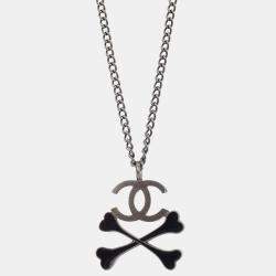 Pre Owned Chanel CC Crossbones Pendant Necklace Silver Black