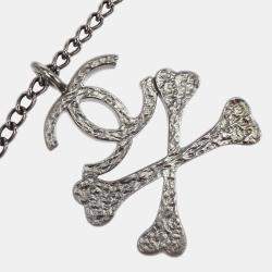 Pre Owned Chanel CC Crossbones Pendant Necklace Silver Black