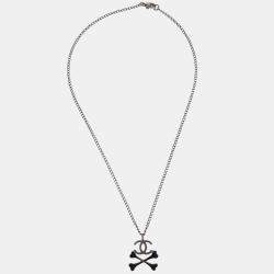 Pre Owned Chanel CC Crossbones Pendant Necklace Silver Black
