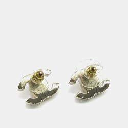 مملوكة مسبقًا Chanel Gold Tone Logo Earrings