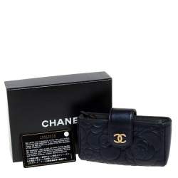 Pre Owned Chanel Metallic Navy Blue Camellia Embossed Leather Phone Pouch