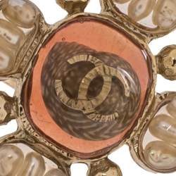 Pre Owned خاتم كوكتيل شانيل سي سي إيناميل كريمي وبني محمر مقاس EU 55