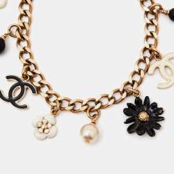 مملوكة مسبقًا Chanel Gold Tone Daisy & Camelia Enamel Charms Bracelet