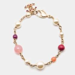 Chanel Gold Tone Pink Beaded CC Charm Bracelet