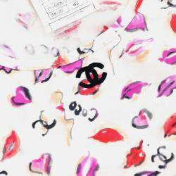 مملوكة مسبقًا توب شانيل أحمر شفاه مقطوع بلا أكمام أبيض #42