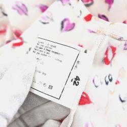 مملوكة مسبقًا توب شانيل أحمر شفاه مقطوع بلا أكمام أبيض #42