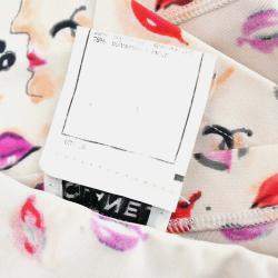 مملوكة مسبقًا توب شانيل أحمر شفاه مقطوع بلا أكمام أبيض #42