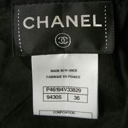 مملوكة مسبقًا فستان شانيل كتان أسود تفصيل فيونكة ميني صغير