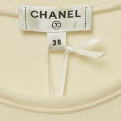 مملوكة مسبقًا توب شانيل جيرسي كريمي بكشكشة مقاس متوسط (ميديم)