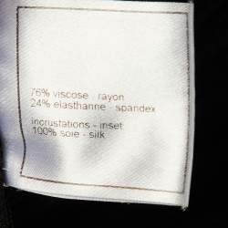 Pre Owned كارديجان شانيل أسود تريكو بتفاصيل فيونكة مقاس كبير (لارج)