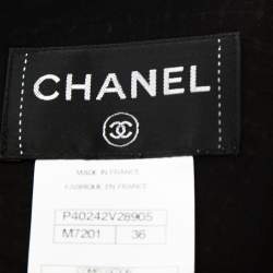 مملوكة مسبقًا فستان شانيل قصير صوف تويد مخطط أسود S