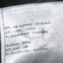 Pre Owned Chanel Black Camelia Applique Leather Pants M