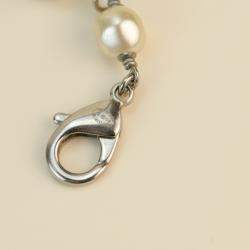 Pre Owned Chanel CC Logo Pearl & Onyx Long Pearl Necklace in Gilt Metal