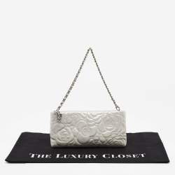 Pre Owned Chanel Grey Shimmer Nubuck Leather Camelia Embossed Chain Clutch