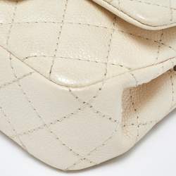 Pre Owned Chanel Pearl Beige Quilted Caviar Leather New Mini Classic Flap Bag