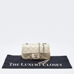 Pre Owned Chanel Pearl Beige Quilted Caviar Leather New Mini Classic Flap Bag