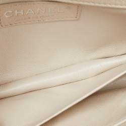Pre Owned Chanel Pearl Beige Quilted Caviar Leather New Mini Classic Flap Bag