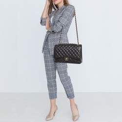 Pre Owned Chanel Black Quilted Caviar Leather Maxi Classic Double Flap Bag