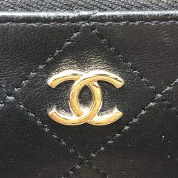 Chanel Beige/Black Raffia Flap Bag