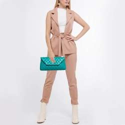 Pre Owned Chanel Turquoise Quilted Leather Fold Up Again Clutch