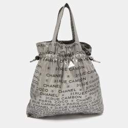 Pre Owned Chanel Silver Coated Nylon 31 Rue Cambon Graphic Drawstring Tote