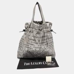 Pre Owned Chanel Silver Coated Nylon 31 Rue Cambon Graphic Drawstring Tote