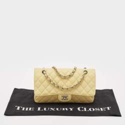 Pre Owned Chanel Yellow Caviar Quilted Leather Medium Classic Double Flap Bag