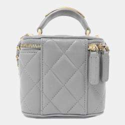 Chanel Quilted Lambskin with Metal Mini CC Top Handle Vanity Case with Chain