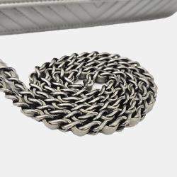 Pre Owned Chanel Silver Leather Caviar Chevron WOC Mini Crossbody Bag
