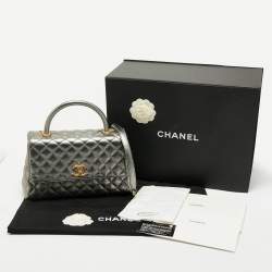 Pre Owned Chanel Silver Quilted Caviar Leather Small Coco Top Handle Bag