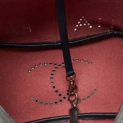 Pre Owned Chanel Navy Blue Leather Perforated CC Eyelet Drawstring Bucket Bag