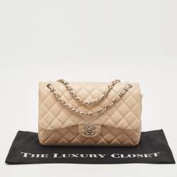 Pre Owned Chanel Light Beige Quilted Caviar Leather Jumbo Classic Double Flap Bag