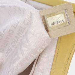 Pre Owned Chanel Yellow Lambskin Camellia Frame Clutch