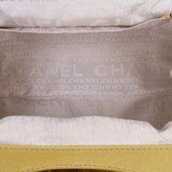 Pre Owned Chanel Yellow Lambskin Camellia Frame Clutch