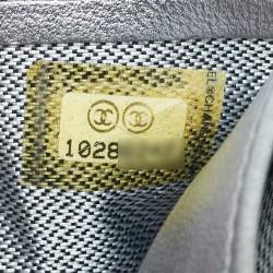 مملوكة مسبقًا محفظة شانييل جيوب سي سي رأسية جلد مخطط أسود